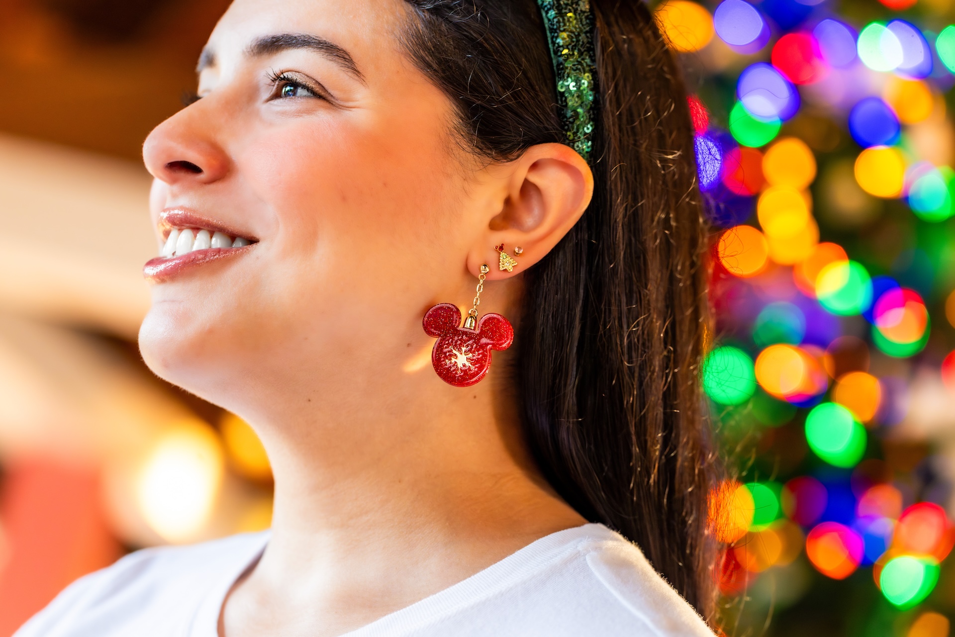 Holiday earrings featuring festive designs