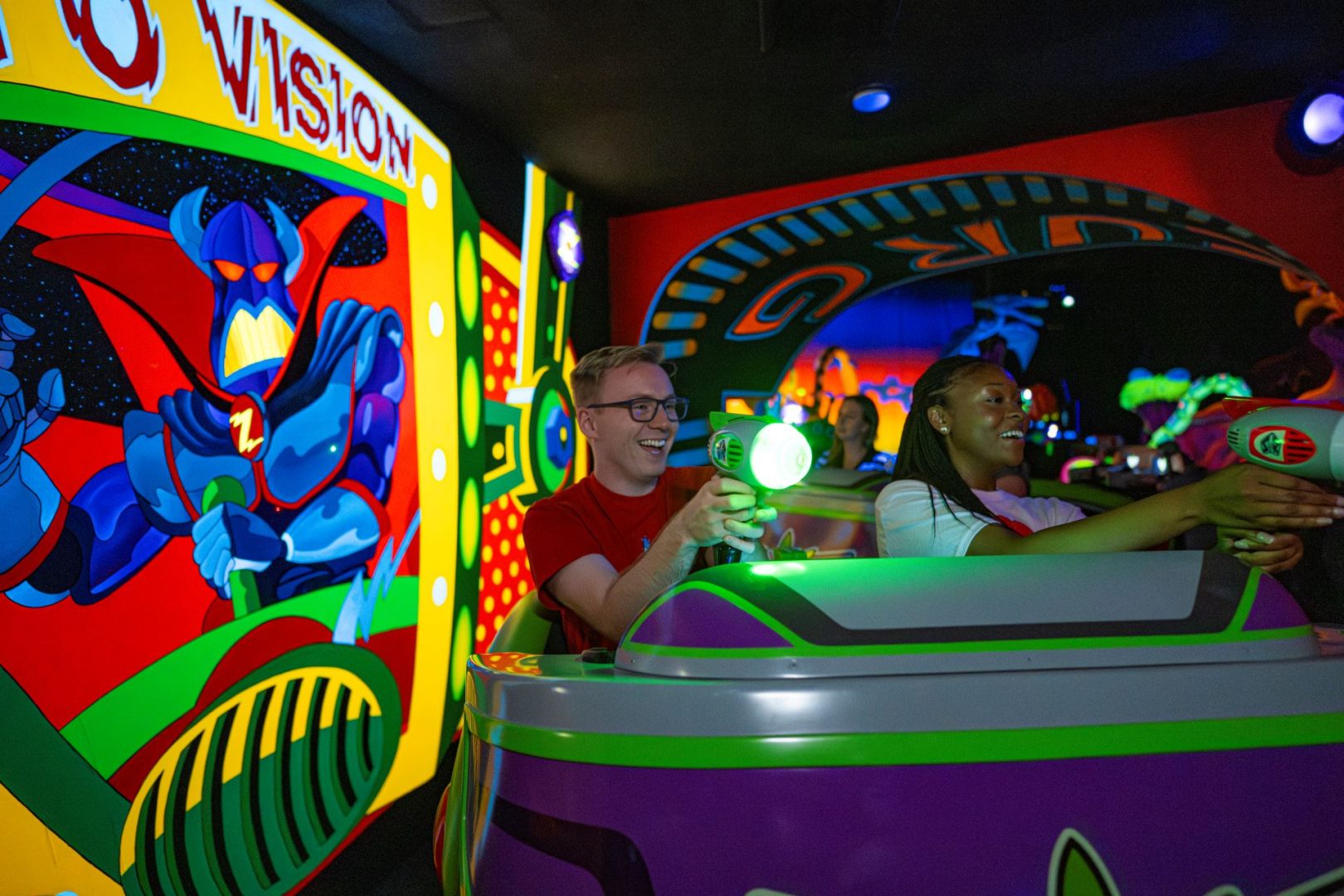 Players competing for high scores on the updated attraction