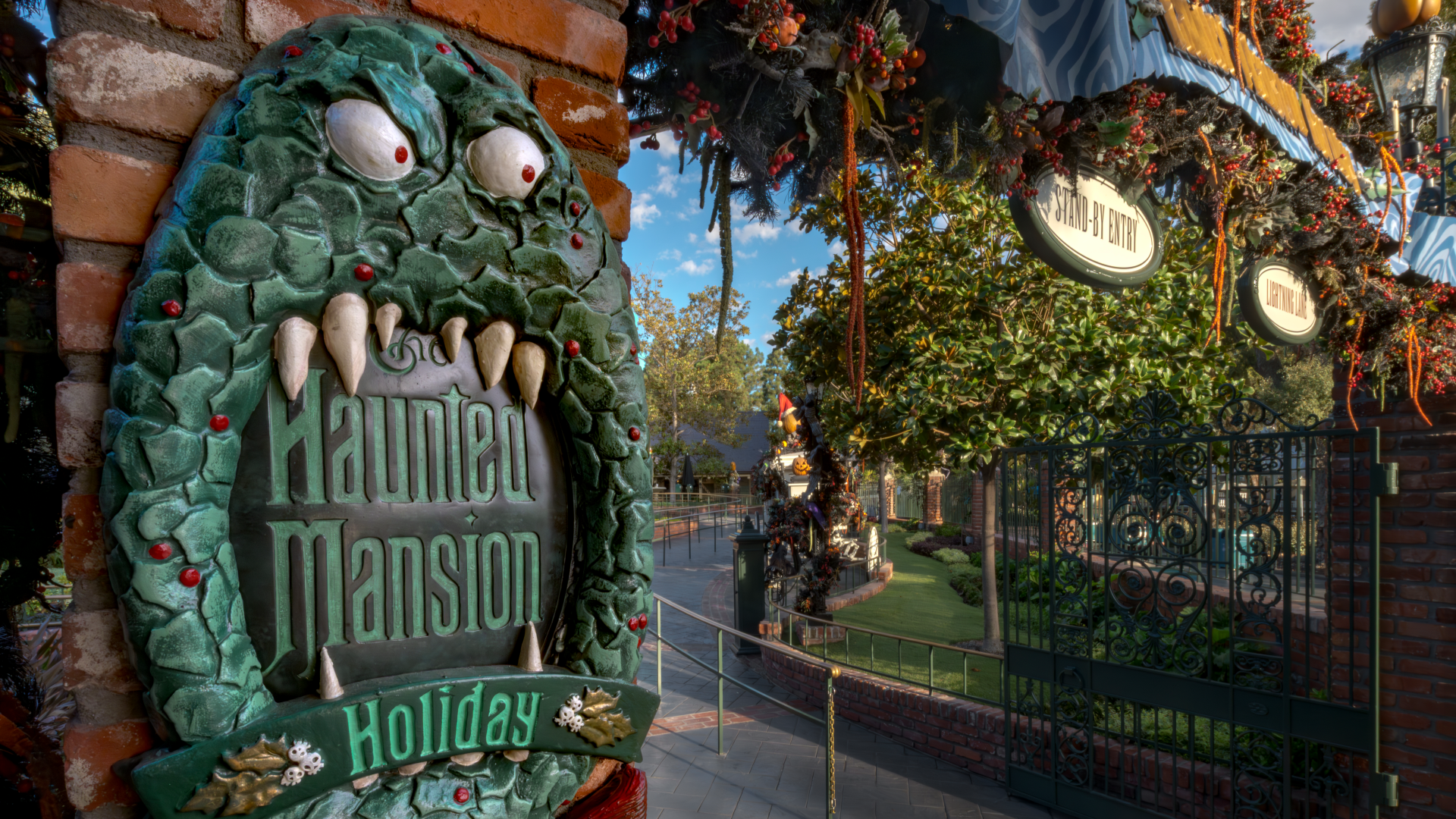 Haunted Mansion Holiday exterior with festive decorations