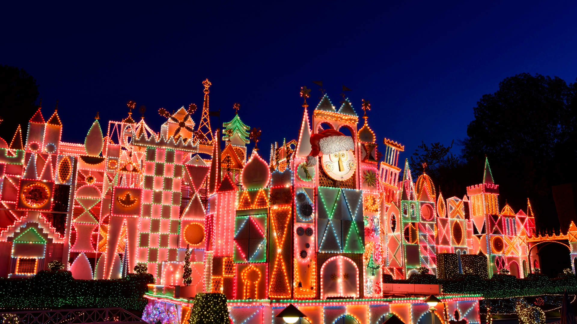 it's a small world Holiday exterior with twinkling holiday lights