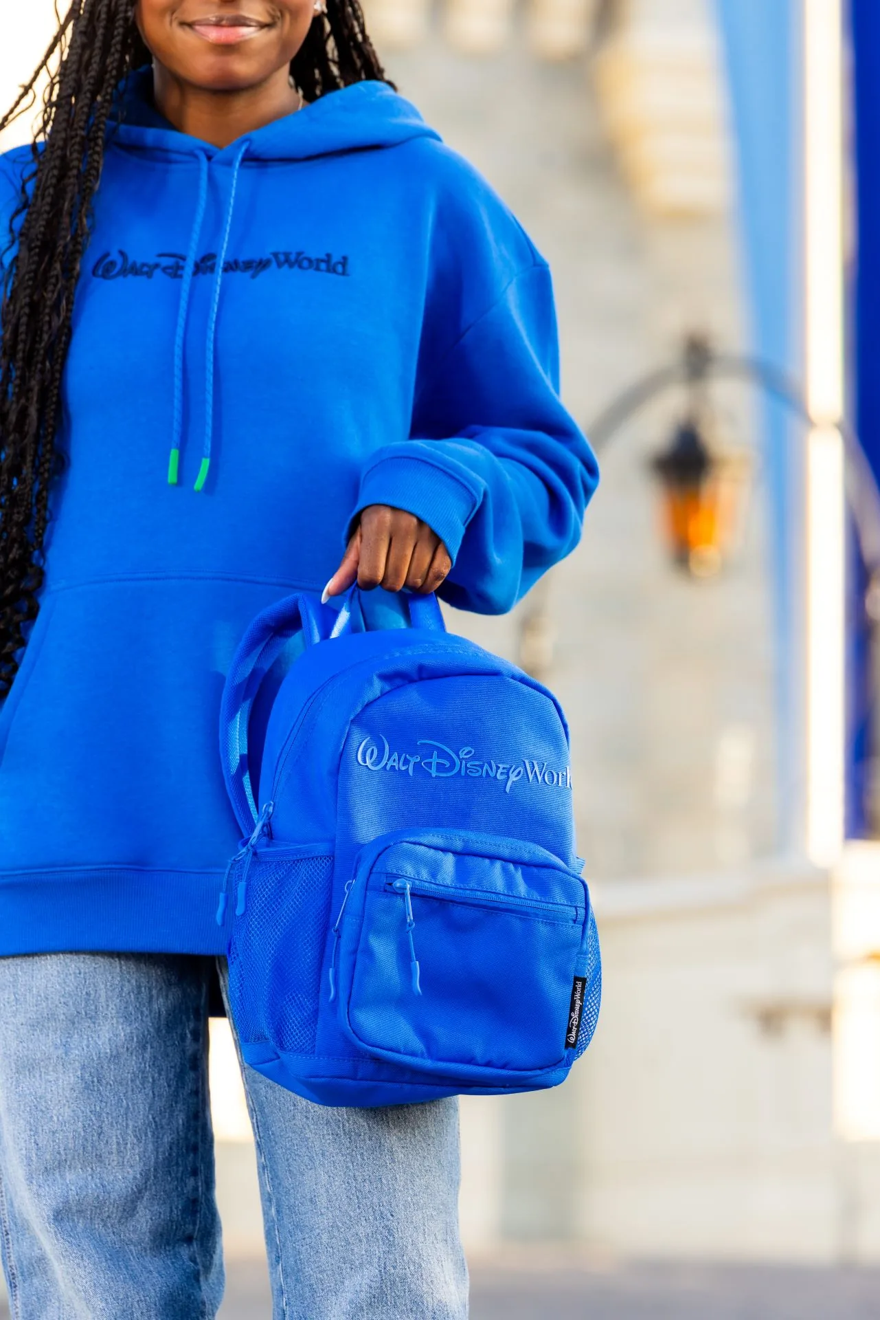 Last Day of Trip Blues sweatshirt and bag showing detailed blue collection items