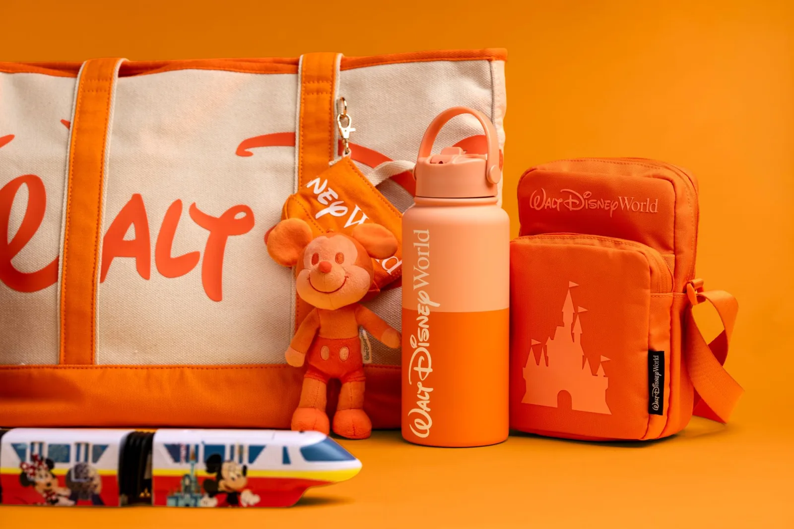 Park Hopper limited-time orange collection with monorail signature element