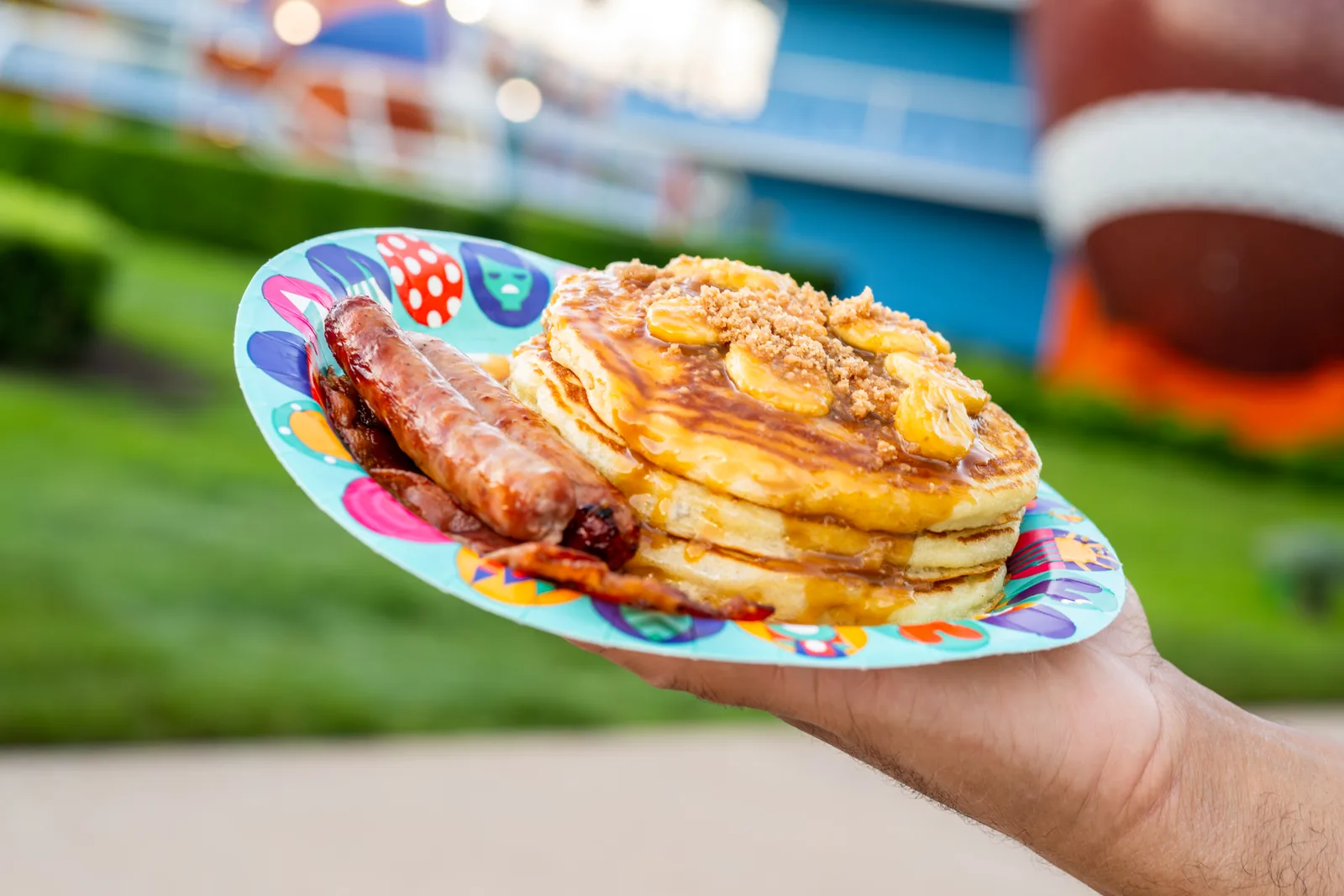 Caramel-Banana Pancakes served with bacon and sausage