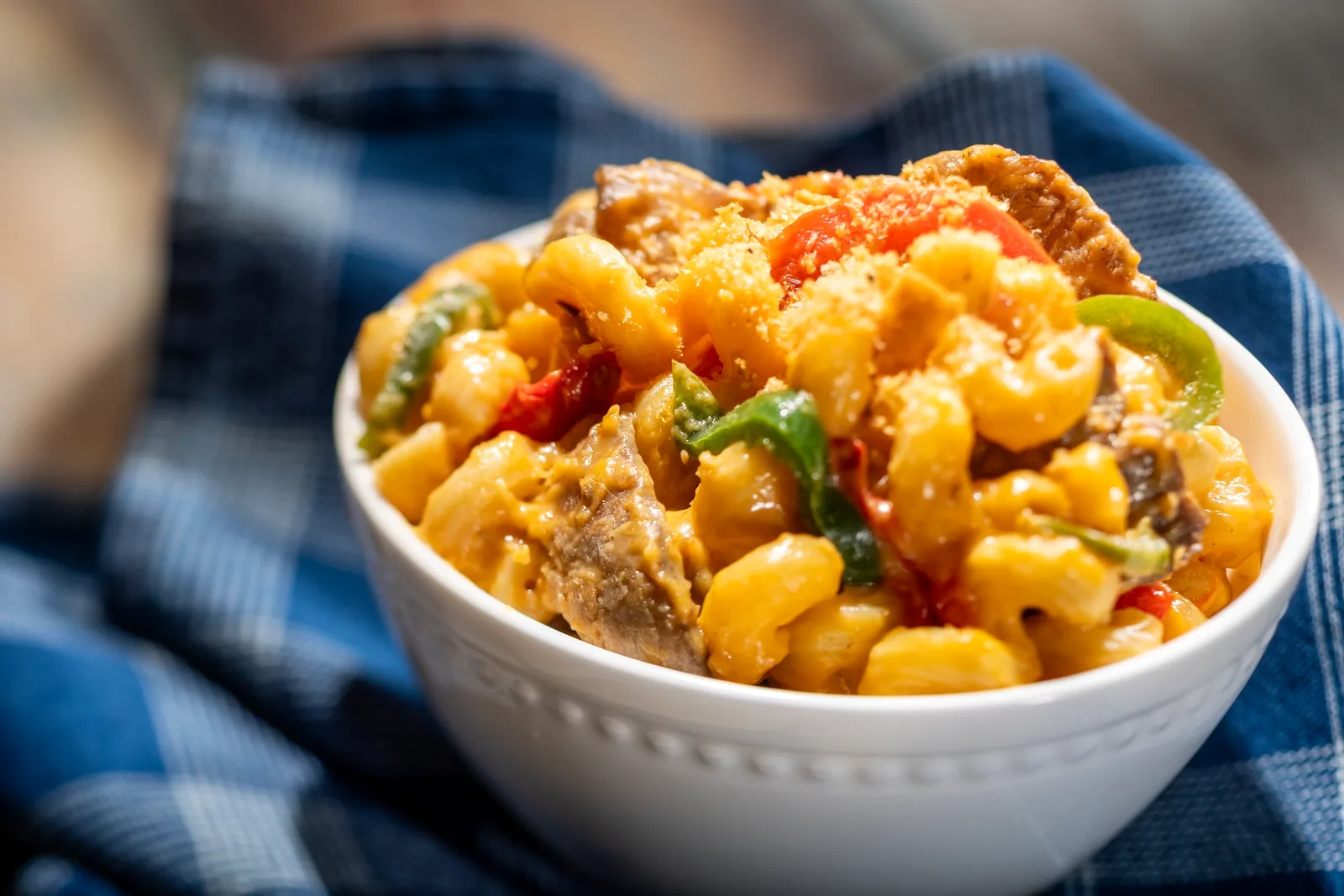 Cheesesteak Macaroni and Cheese with beef, peppers, and onions