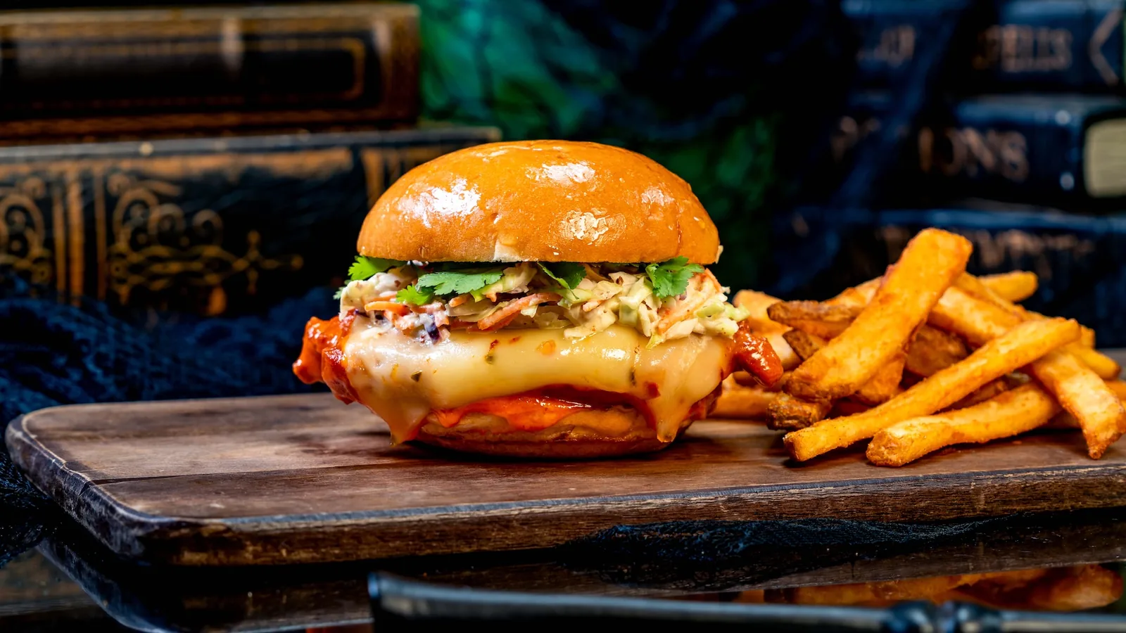 Spicy Chicken Sandwich: Panko-breaded fried chicken in spicy chile sauce with pepper jack and mustard slaw on brioche