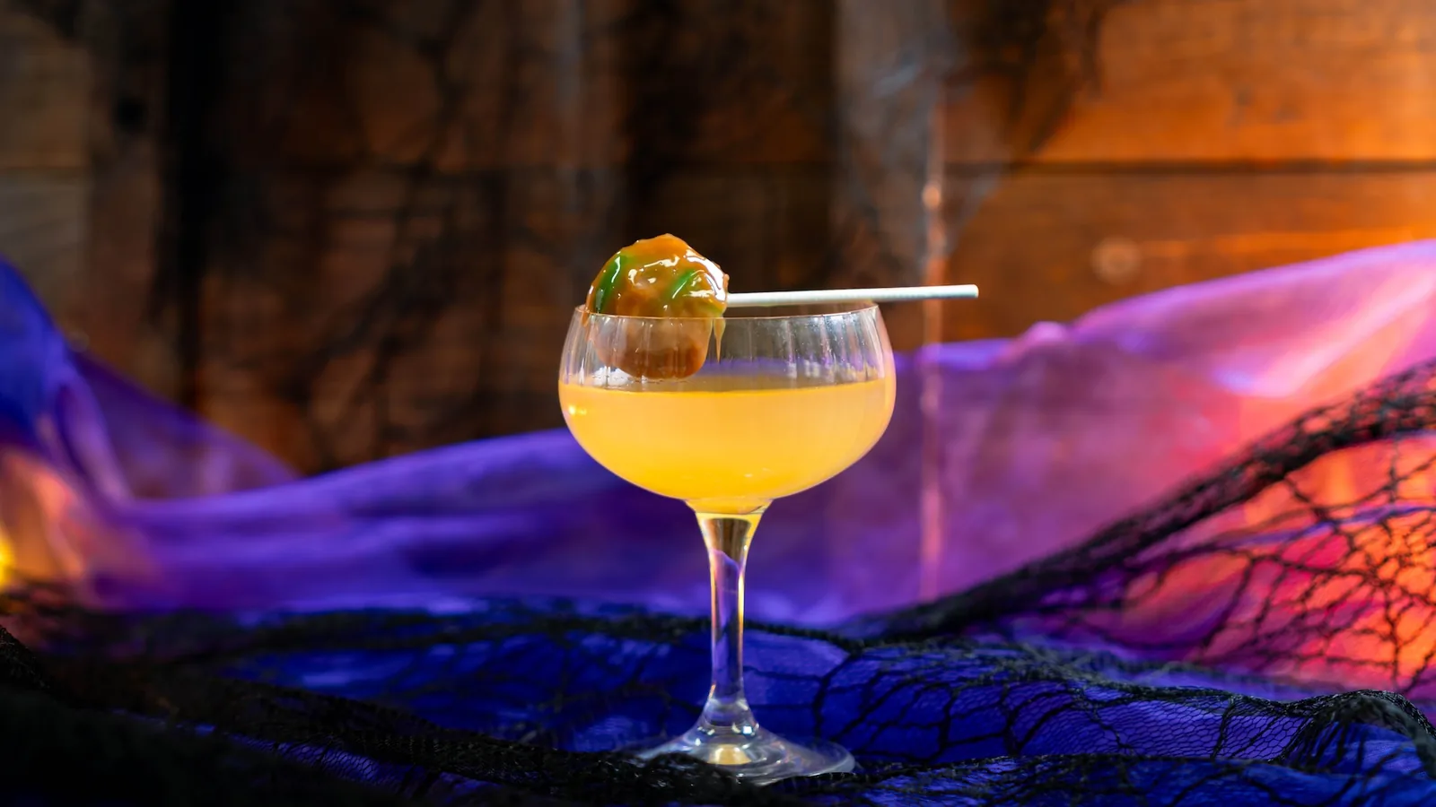 Caramel Apple Martini with Caramel Smirnoff Vodka and caramel apple lollipop