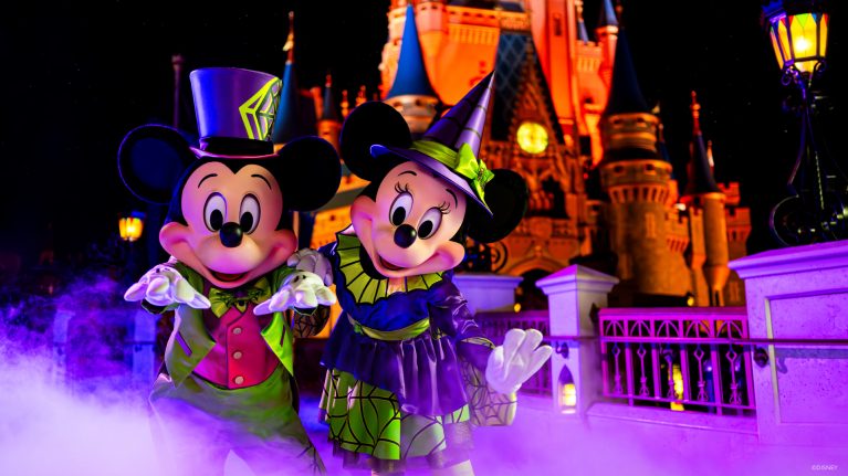 Mickey and Minnie in their Halloween outfits at Town Square Theater