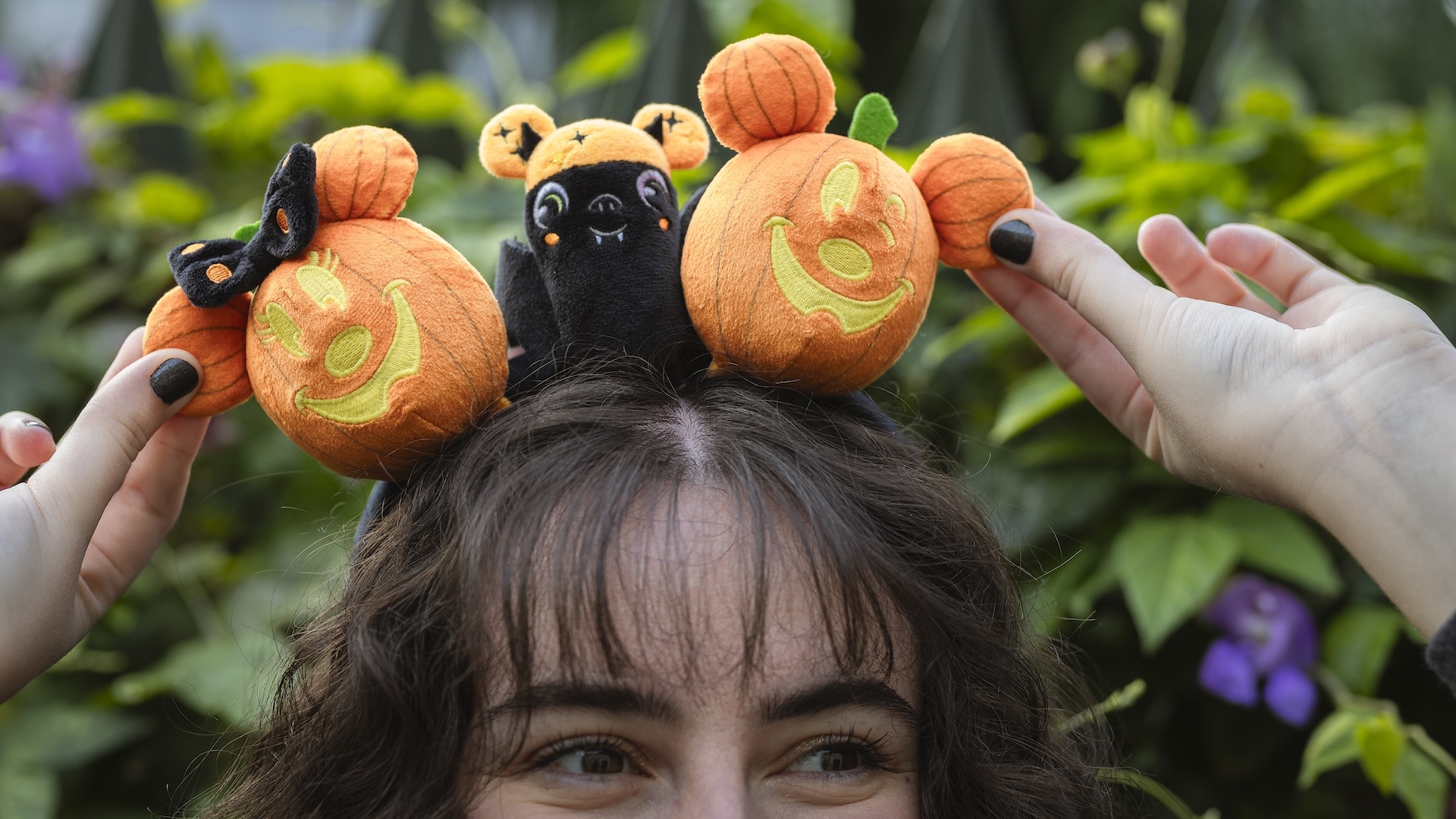 Create-your-own headband with pumpkin Mickey and Minnie plush