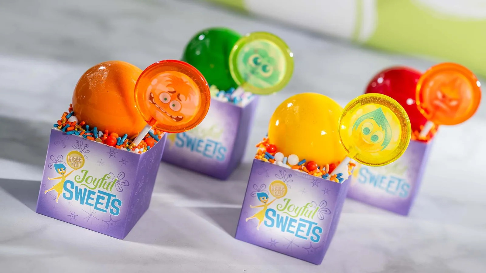 Emotion-themed cupcakes including Joy, Anger, Anxiety, and Envy flavors